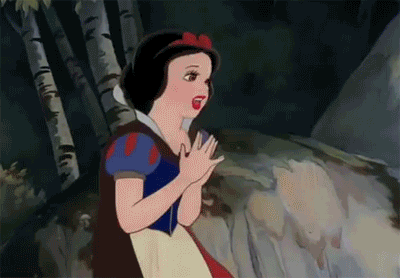 A Gif of Snow White feeling overwhelmed and scared and running into the woods.